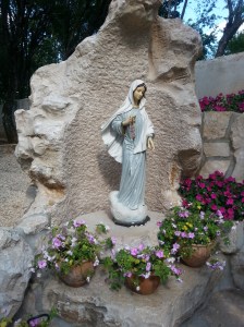 Our Lady's statue with Cross