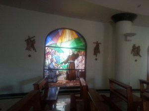 Beautiful stained glass of Padre Pio in hotel chapel